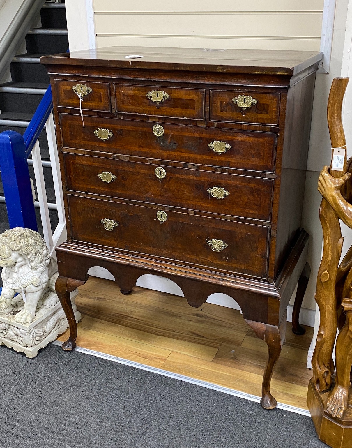 An 18th century and later banded walnut chest on stand, width 99cm, depth 56cm, height 138cm